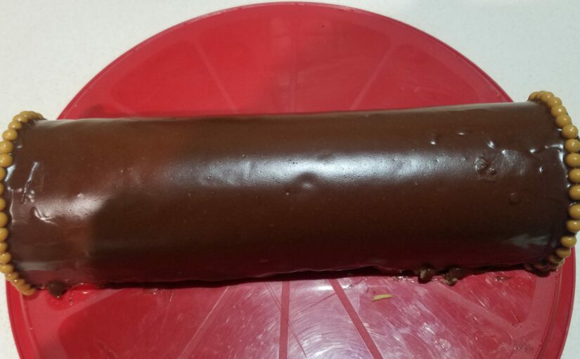 Bûche chocolat au lait, fruits de la passion